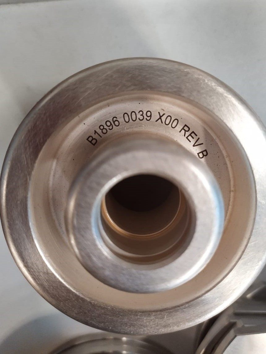 Laser marked precision component with part identification