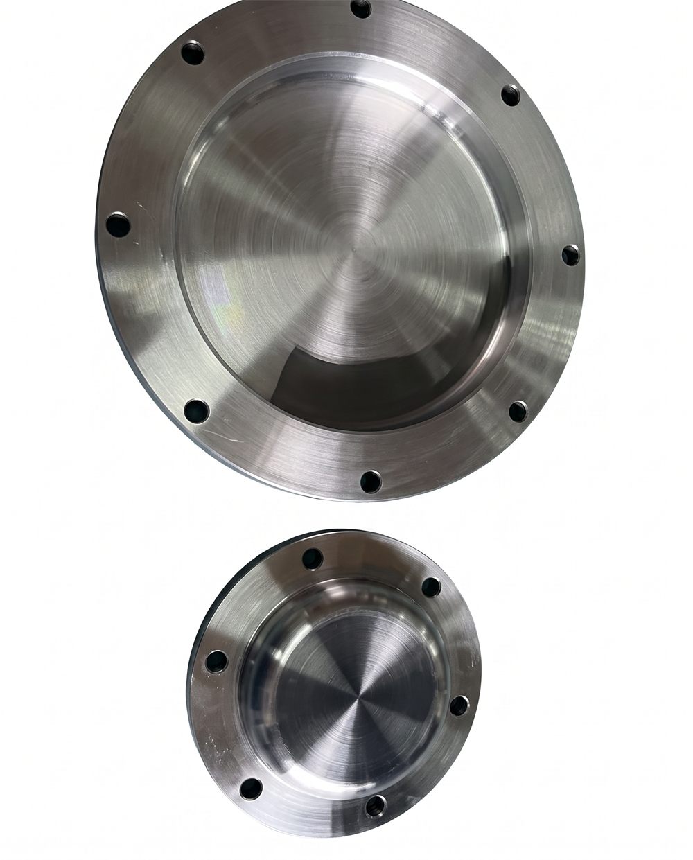 Pair of machined aluminium flanges of differing diameters